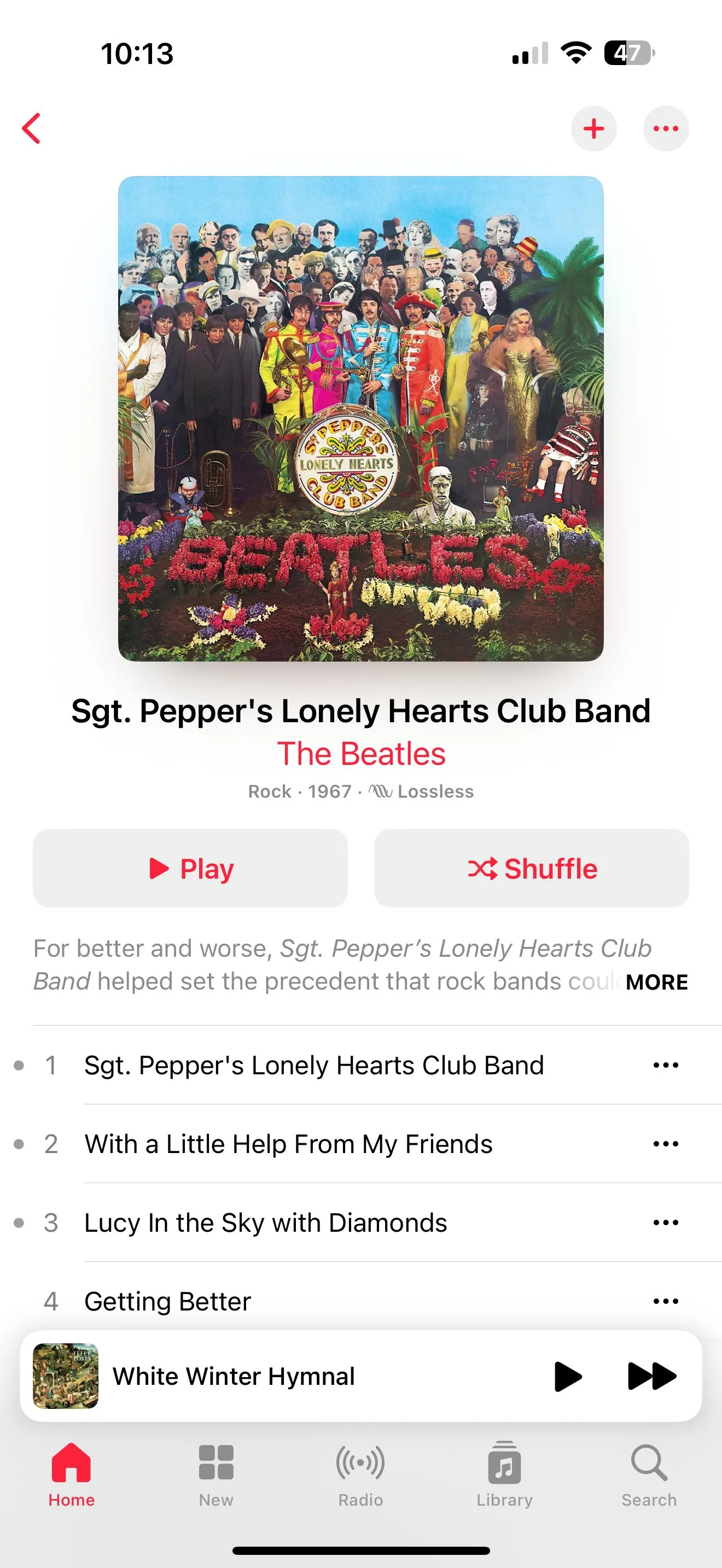 Giao diện ứng dụng Apple Music hiển thị trang album nhạc với tùy chọn "Tạo đài phát" (Create Station).