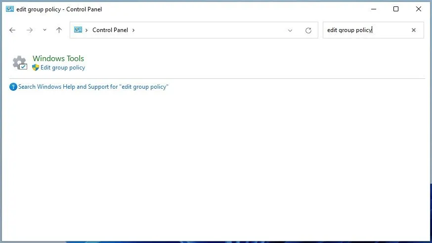 Tìm và mở Group Policy Editor thông qua thanh tìm kiếm trong Control Panel hoặc ứng dụng Settings của Windows 11.